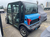 Mobil Golf Listrik 4 Kursi Tertutup dengan Sistem AC Pendingin Udara Motor 5kw Kecepatan 50km/jam dengan Tempat Penyimpanan Tas Golf Belakang Baterai GEL