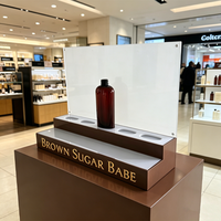 Présentoir de vente au détail en acrylique de qualité supérieure avec logo personnalisé pour les présentoirs de parfums, les huiles essentielles, les lotions pour la peau