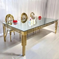 Table de salle à manger en acier inoxydable avec plateau en verre transparent, utilisée pour les tables de salle à manger d'hôtel et les réceptions de mariage
