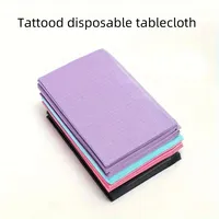 125 pièces de protège-matelas en plastique colorés et imperméables pour poste de travail de tatouage, couvre-tables de tatouage, bavoirs dentaires et accessoires