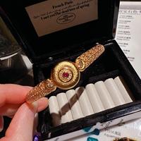 Bracelet de luxe haut de gamme pour femme, style vintage texturé, avec accent zircon et rubis brillants, idéal pour mariage ou banquet, cadeau parfait.