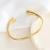 Bracelet ouvert en acier inoxydable 316L, design minimaliste à courbes fluides, couleurs or et argent 18K PVD, hypoallergénique, OEM