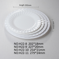 Service de table élégant et lisse en mélamine blanche de qualité alimentaire pour la maison et la restauration, motif pois floraux, comprenant tasses, cuillères, plateau, bols et assiettes.