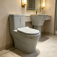 Ensemble WC monobloc en céramique de luxe moderne avec garniture dorée, chasse d'eau double, siège chauffant et lavabo assorti