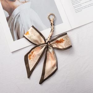 Fabrieksgroothandel Hoge Kwaliteit Mode Lint Sleutelhanger Strik Sjaal Hangertje voor Dames Meisjes - Product Image 2