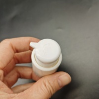 Pompe de traitement lisse noire 24-410 pour emballage de crème et de lotion, pompe distributrice, distributeur de crème