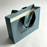 Sacs cadeaux en papier artisanal de luxe, logo imprimé sur mesure, poignée en corde de coton écologique, emballage pour vêtements