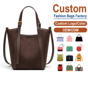 Sac bandoulière en cuir pleine fleur aux lignes structurées et nettes avec surpiqûres ton sur ton, polyvalent pour toutes les occasions – Fabricant de sacs sur mesure - Product Image 1