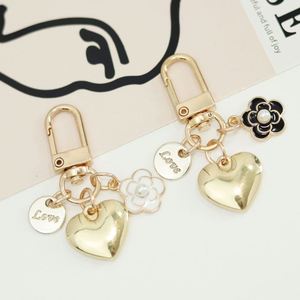 Llaveros Colgantes de Aleación con Forma de Corazón, Bonitos y de Alta Calidad, al por Mayor, con MOQ Bajo, en Stock, para Accesorios de Fundas de Auriculares y Colgantes de Bolsos - Product Image 2