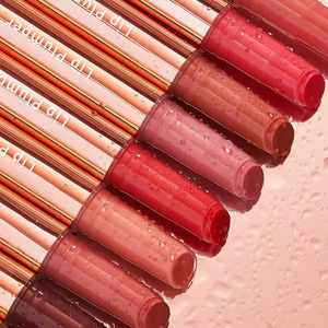 ลิปกลอสเพิ่มความอวบอิ่มสีชมพูแบบกำหนดเองสำหรับแบรนด์ส่วนตัว ลิปบาล์มคุณภาพสูง บำรุงริมฝีปากชุ่มชื้น สูตรวีแกน สีสวยฉ่ำวาว - Product Image 4