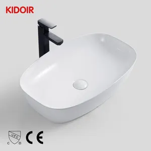 Kidoir chaozhou white color bathroom hand wash ceramic basin 80 cm lavabo counter top oval shaped bathroom sink