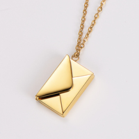 Vente en gros de bijoux vierges gravables personnalisés et gravés cadeaux de Noël personnalisés enveloppe en acier inoxydable collier pendentif