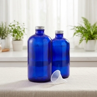 Bouteille en verre bleue en gros pour jus, boissons gazeuses, tequila, boissons à base de canne à sucre et jus fermentés