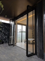 Puertas de Vidrio Plegables de Lujo Modernas con Certificación GCC, Anticorrosivas, Herrajes de Acero Inoxidable 316 para Apartamentos, Residencias Costeras y Villas