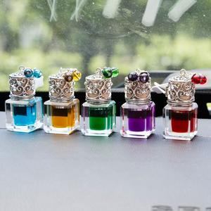 Regalos decorativos para coche de aromaterapia de aceite esencial, salidas de aire de coche refrescantes y desodorizantes, colgantes de botella de Perfume para coche - Product Image 2