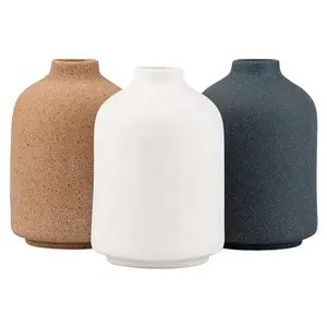 Porzellan süße Knospe Vase kleine ovale Sand glasur Keramik Blumenvase moderne Blumentopf Hochzeit Blumenvase Haupt dekoration