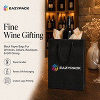 Sacs cadeaux en papier noir personnalisés avec impression de logo en couleur et poignées en corde torsadée pour l'emballage de cadeaux de vin