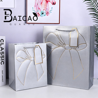 Sac en papier blanc de luxe avec gaufrage, estampage à chaud et impression offset |   Recyclable