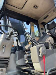 Excavatrice sur pneus Hyundai 210W-9 d'occasion de haute qualité, moteur Cummins, modèle 2015, capacité de la cuve de 1,3 m, composants principaux inclus - Product Image 6