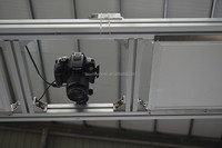 Machine de découpe laser Co2 textile en tissu à alimentation automatique 1600*2500mm avec grande caméra CCD Double tête 2 axes asynchrones