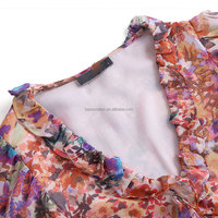 Robe mi-longue haut de gamme décontractée et élégante en mousseline de soie imprimée à col en V avec détails à volants Design à plusieurs niveaux taille haute pour femmes