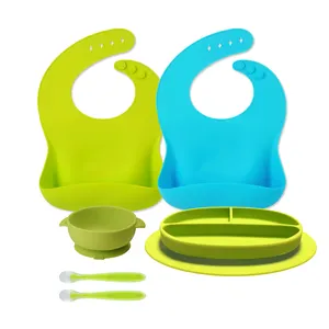 Wholesale silicone baby feeding set feed baby food supplies include baby bib suction bowl spoon and plate