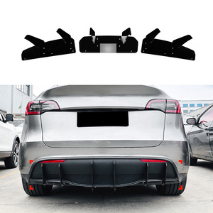 Spoiler de pare-chocs arrière Tesla Model Y, noir brillant, matériau PP, 2019+, installation avec ruban adhésif ou vis - Product Image 1