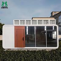 Maison conteneur contemporaine en acier Apple Capsule, préfabriquée, moderne, minimaliste, durable, avec structure en acier robuste et panneaux sandwich pour