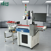 Machine tout-en-un de codage laser pour bouchons de bouteilles en plastique avec laser UV 355 nm, alimentateur vibrant et inspection visuelle