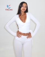Ensemble de yoga 2 pièces pour femme : haut court à manches longues avec décolleté en V profond et lien, pantalon évasé à taille plissée – Idéal pour l'entraînement, le Pilates, la gym, les tenues de sport et de détente