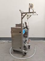Machine de remplissage et de scellage verticale économique pour la production de bâtonnets de glace, de gelée, de miel en petits sachets – Excellent rapport qualité-prix
