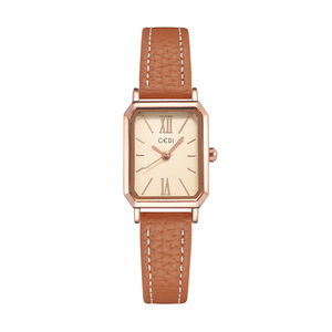 Élégante montre pour femme à cadran blanc et or rose ; montre à quartz vintage à petit cadran carré avec bracelet en cuir noir – un best-seller. - Product Image 3