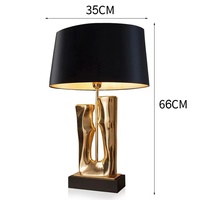 Lampe de lecture décorative moderne pour hôtel, lampe de table en résine et tissu avec finition or et noir