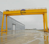 Grue portique électrique à double poutre de type mobile avec cabine de commande et grappin, dotée d'un moteur, d'une boîte de vitesses et d'un roulement