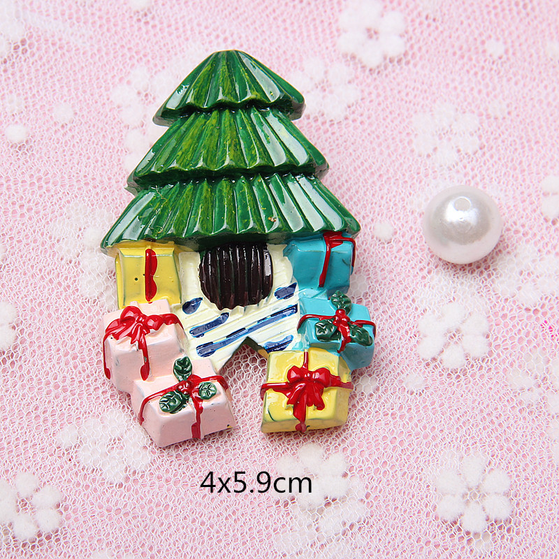 Arbre de Noël de cadeau de cheminée