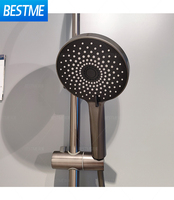 Ensemble de douche cascade gris anthracite avec jet massant, barre coulissante murale, installation apparente moderne, pommeau de douche haute pression pour salle de bain