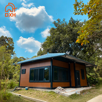 conteneur préfabriquée détachable panneaux sandwich mobiles conteneur plat produits de construction chinois pour salle de jardin