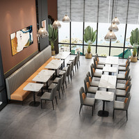 Ensemble table et chaises en pierre frittée de style moderne et luxueux, orange et gris, pour restaurant, kiosque de plage