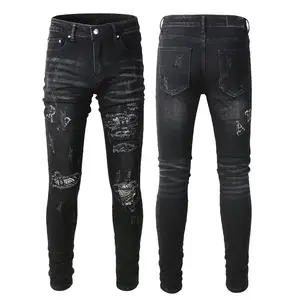 Vendita all'ingrosso dei jeans degli uomini scarni brandelli-Jeans da motociclista da uomo rock revival jeans strappati skinny grandi jeans da uomo di alta qualità