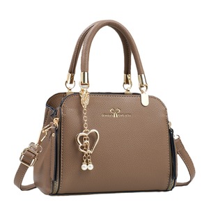 Hot-selling 2026 <strong>Pearl</strong> Solid Color Elegant Fashion Shoulder Crossbody Bags Luxury Women's <strong>Handbags</strong> - Product Image 5