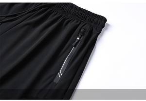 Venta al por mayor de pantalones cortos para correr deportivos de secado rápido para hombre verano gimnasio entrenamiento personalizado cremallera bolsillo playa pantalones cortos hasta la rodilla para los hombres - Product Image 5