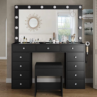 Table de toilette noire glamour avec lumières LED Hollywood et plusieurs tiroirs de rangement pour une décoration intérieure élégante