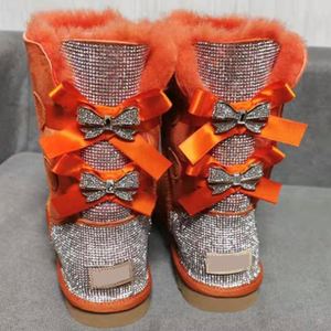 Logo personnalisé en usine bottes <span class=keywords><strong>de</strong></span> <span class=keywords><strong>neige</strong></span> chaudes en peau <span class=keywords><strong>de</strong></span> mouton antidérapantes pour l'hiver avec nœud papillon pour femmes bottes <span class=keywords><strong>de</strong></span> luxe en fourrure avec nœuds - Product Image 4