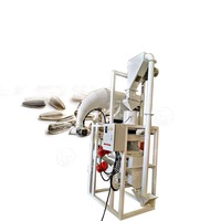 Machine automatique de décorticage, d'épluchage et d'élimination des graines de tournesol