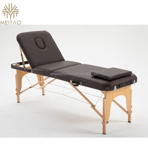 Cama de belleza moderna con parte superior acolchada, cajones y estantes de almacenamiento integrados, ideal para uso en spa y salón - Product Image 4