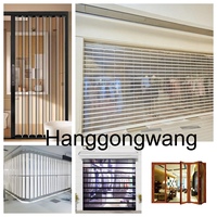 Porte coulissante pliable silencieuse du centre commercial intérieur moderne de Yiwu volet roulant en alliage d'aluminium cloison épaissie en cristal