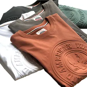 ファッションストリートウェアカスタムグラフィックプルオーバープレミアムヘビーコットンポリエステルTシャツプラスサイズユニセックス3Dエンボス印刷Tシャツ