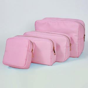 Sac cosmétique en nylon rayé personnalisable avec fermeture éclair, grande capacité, style féminin, imperméable, écologique, couleurs vives, quatre compartiments - Product Image 1