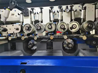 Machine à profiler le bois à six têtes et quatre côtés haute vitesse pour la production de panneaux à joint en croisillons