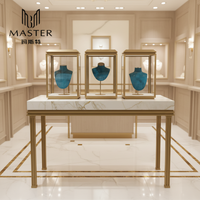 Vitrina de Exhibición de Joyería de Metal Dorado MASTER con Iluminación LED Superior, Exhibidor de Joyería con Base para Mostrador de Boutique de Lujo OEM
